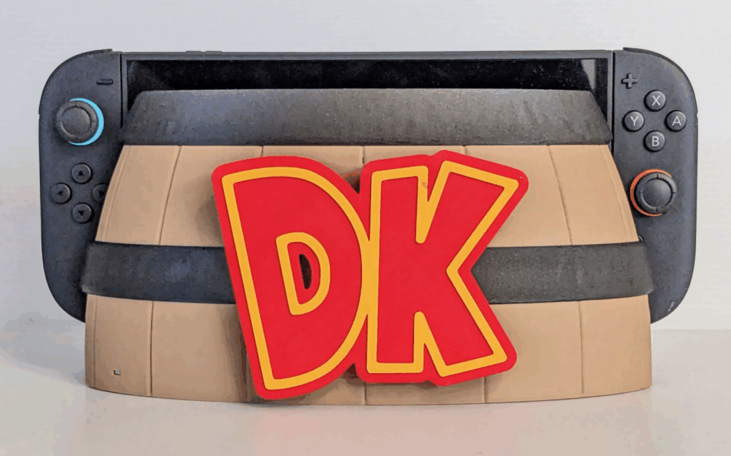 Jogador desenvolve capa de dock para Nintendo Switch 2 em formato de barril Donkey Kong